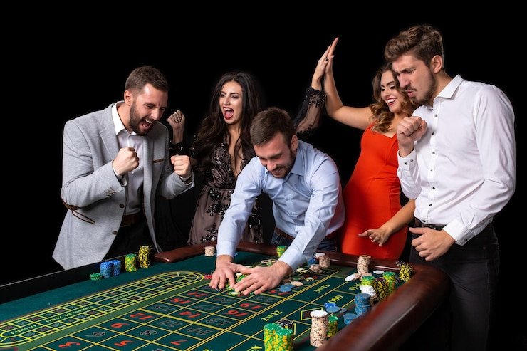 Multi-camera view of live dealer studio with professional lighting and card table setup